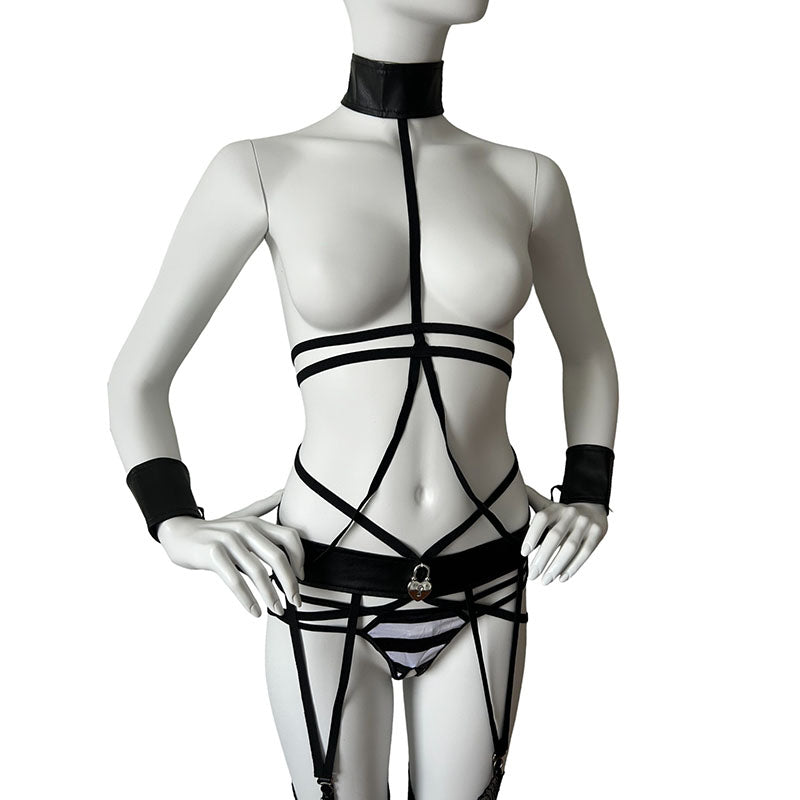 
                      
                        Fever Vinyl Bondage Collar, Cuffs and Suspender Set
                      
                    